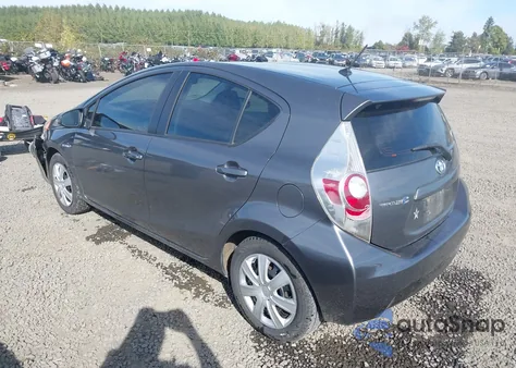 2014 Toyota Prius C Two z USA, uszkodzony, nr VIN JTDKDTB38E1571758